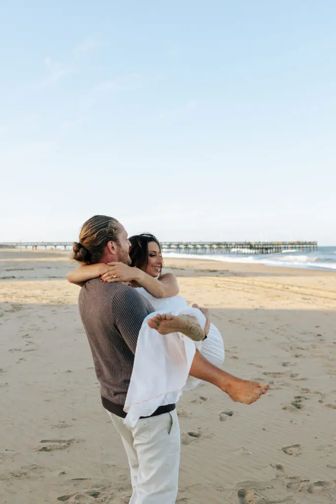 virginia couples photoshoot where a man is carrying his fiance 