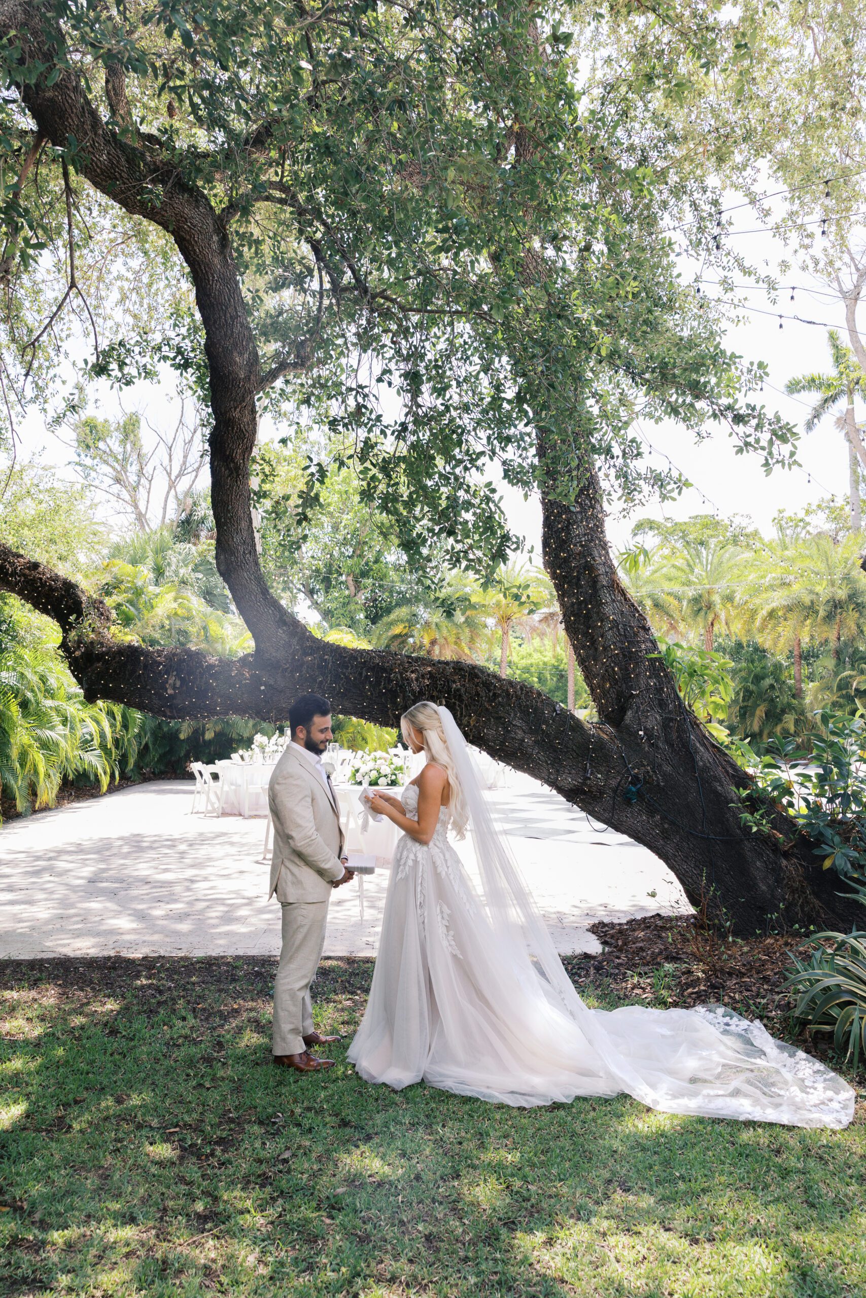 Groom and bride taking first look portraits at the alderman house in florida
